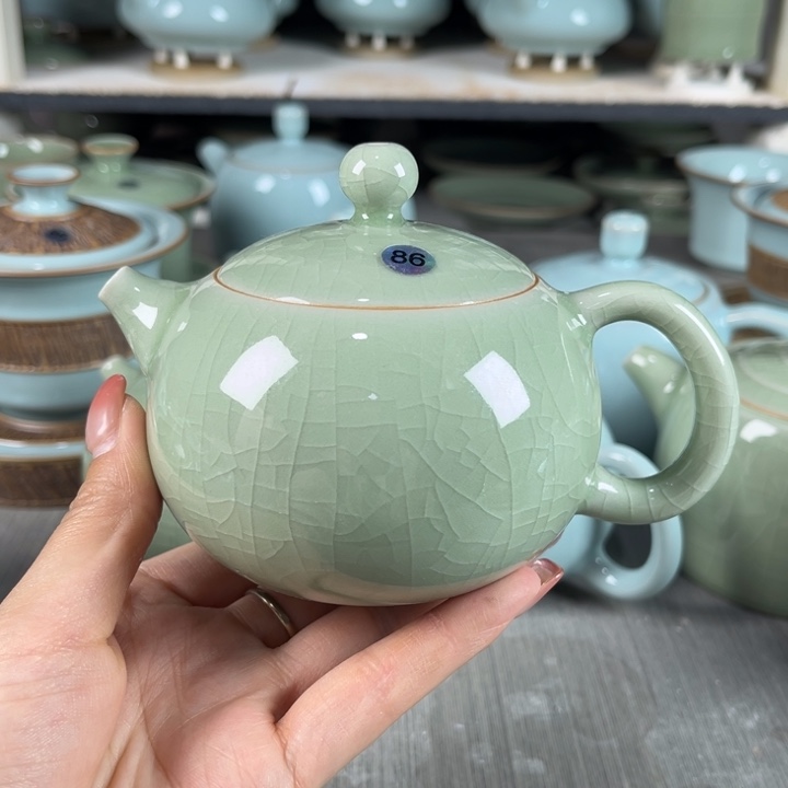 蔡***乐86号微瑕豆绿西施壶