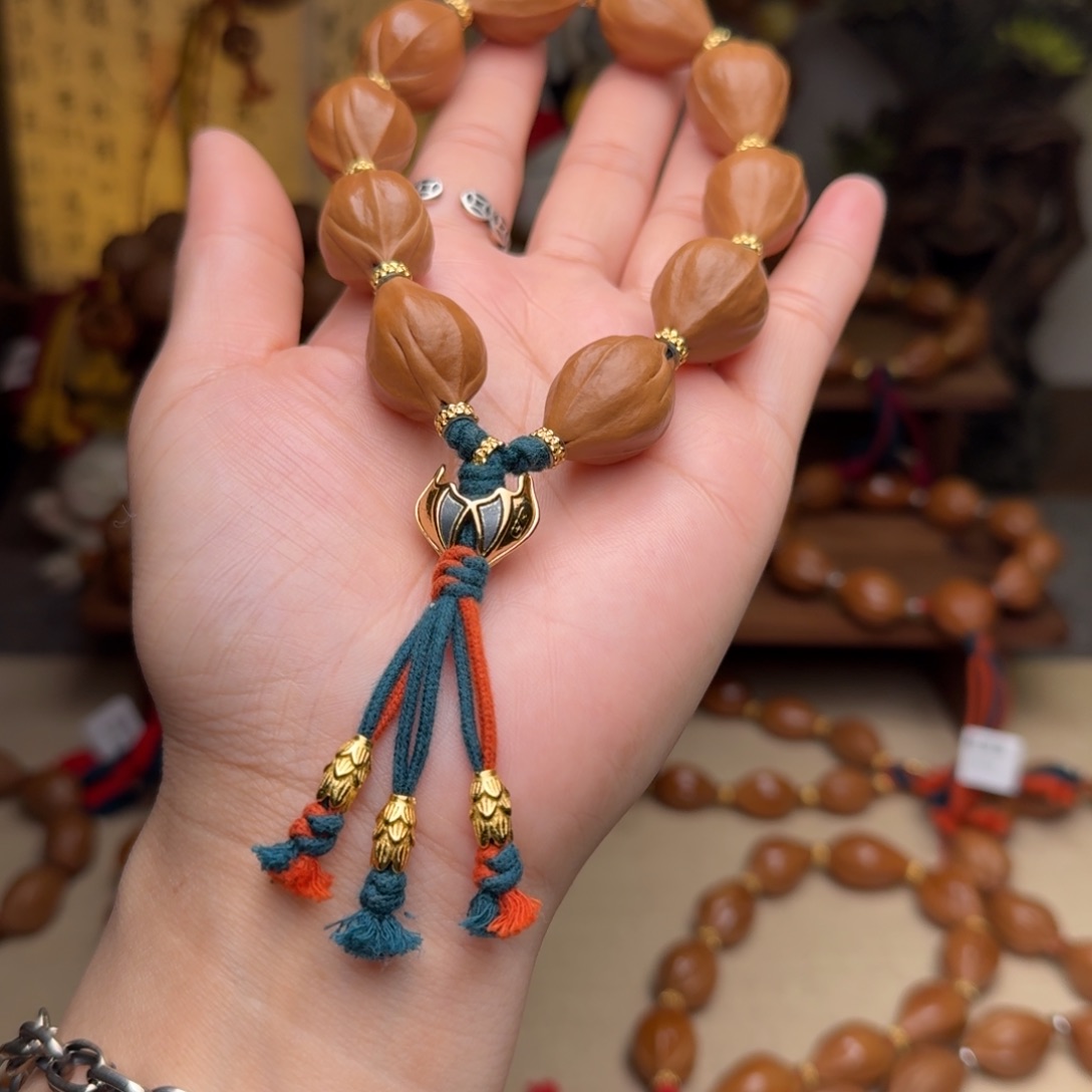 橄榄核手串韩*17*26三面佛正宗梅林铁核