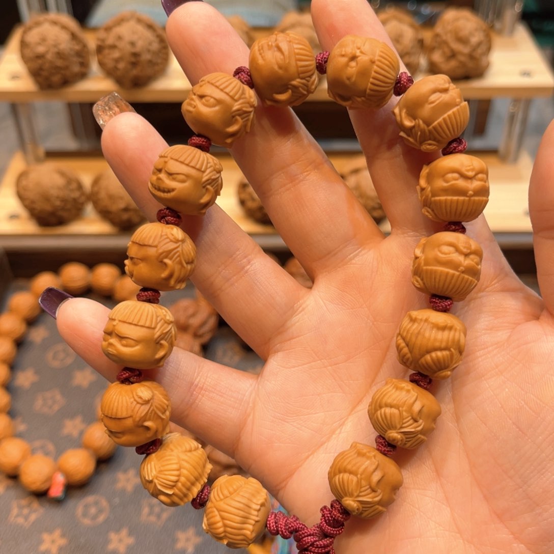 文玩核桃把件鹏哪吒人生百态手持