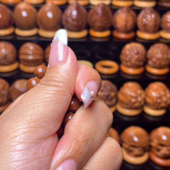 橄榄核把件王****糖橄榄雕刻