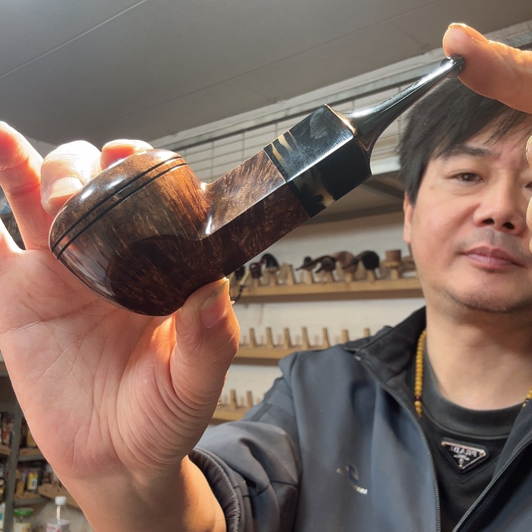 七*焦耀烟斗一牛头