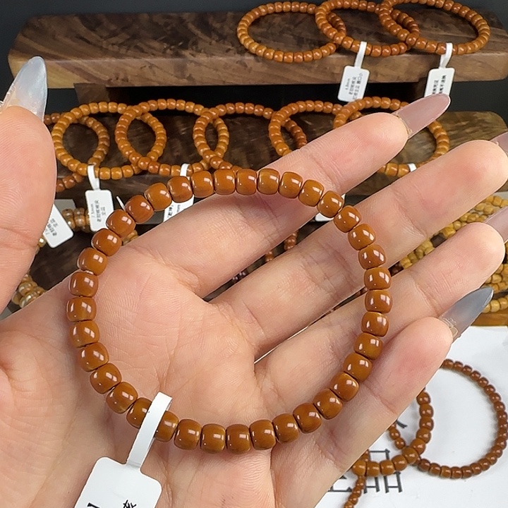 王***创手串橄榄核6.1mm 老挝核核尖全品