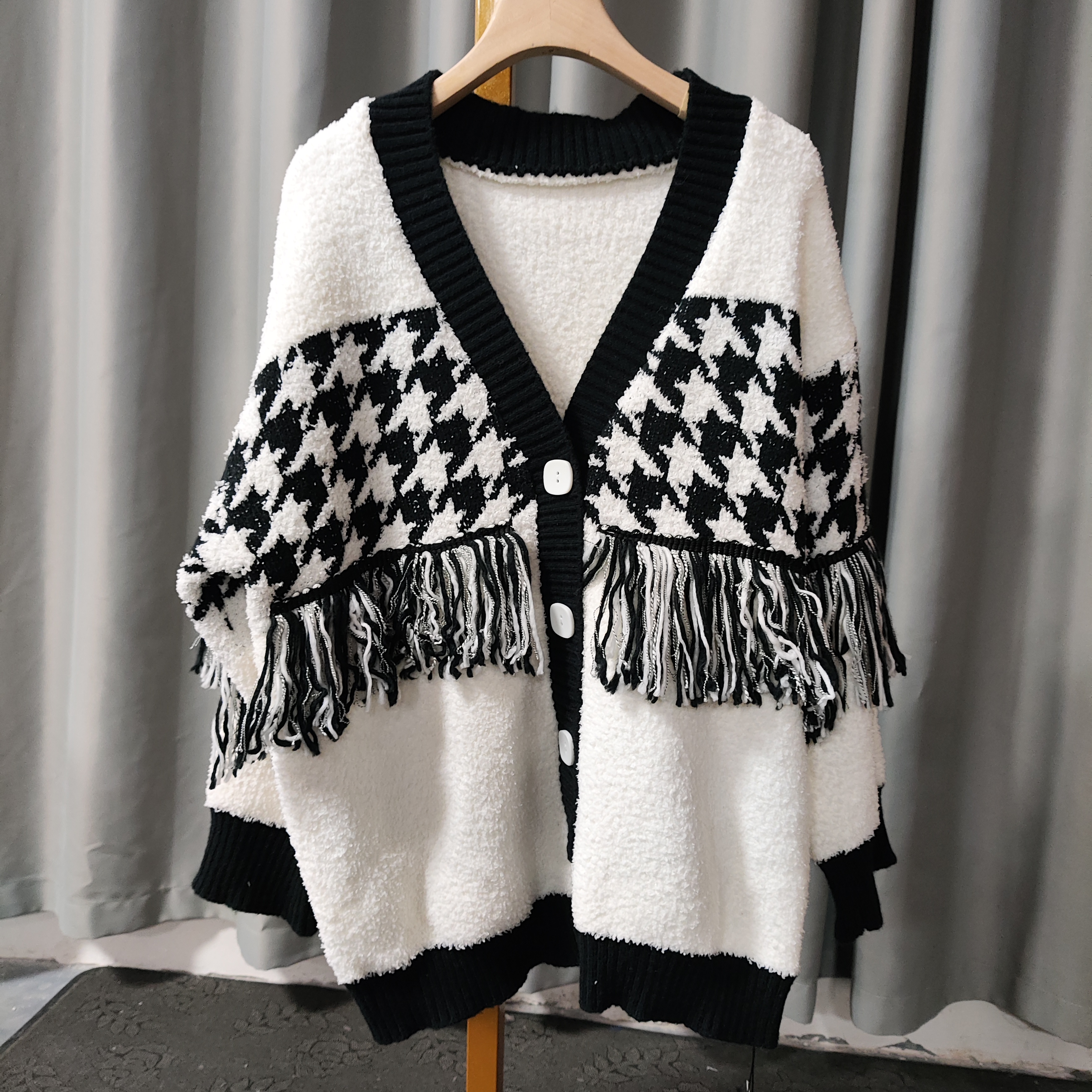 A160  时尚流速女士针织V领开衫