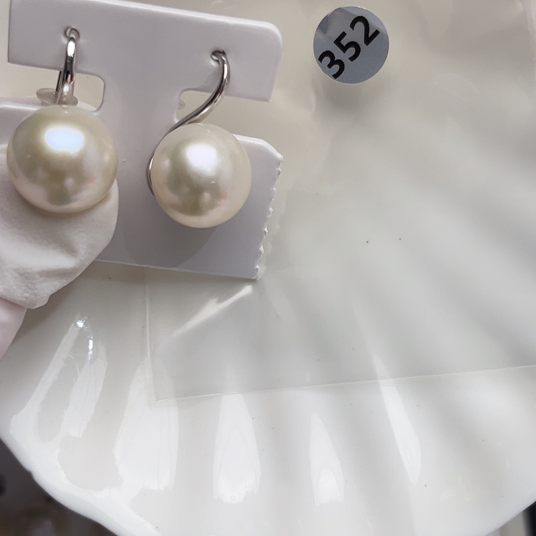 小***紫耳饰银S925镶嵌淡水珍珠