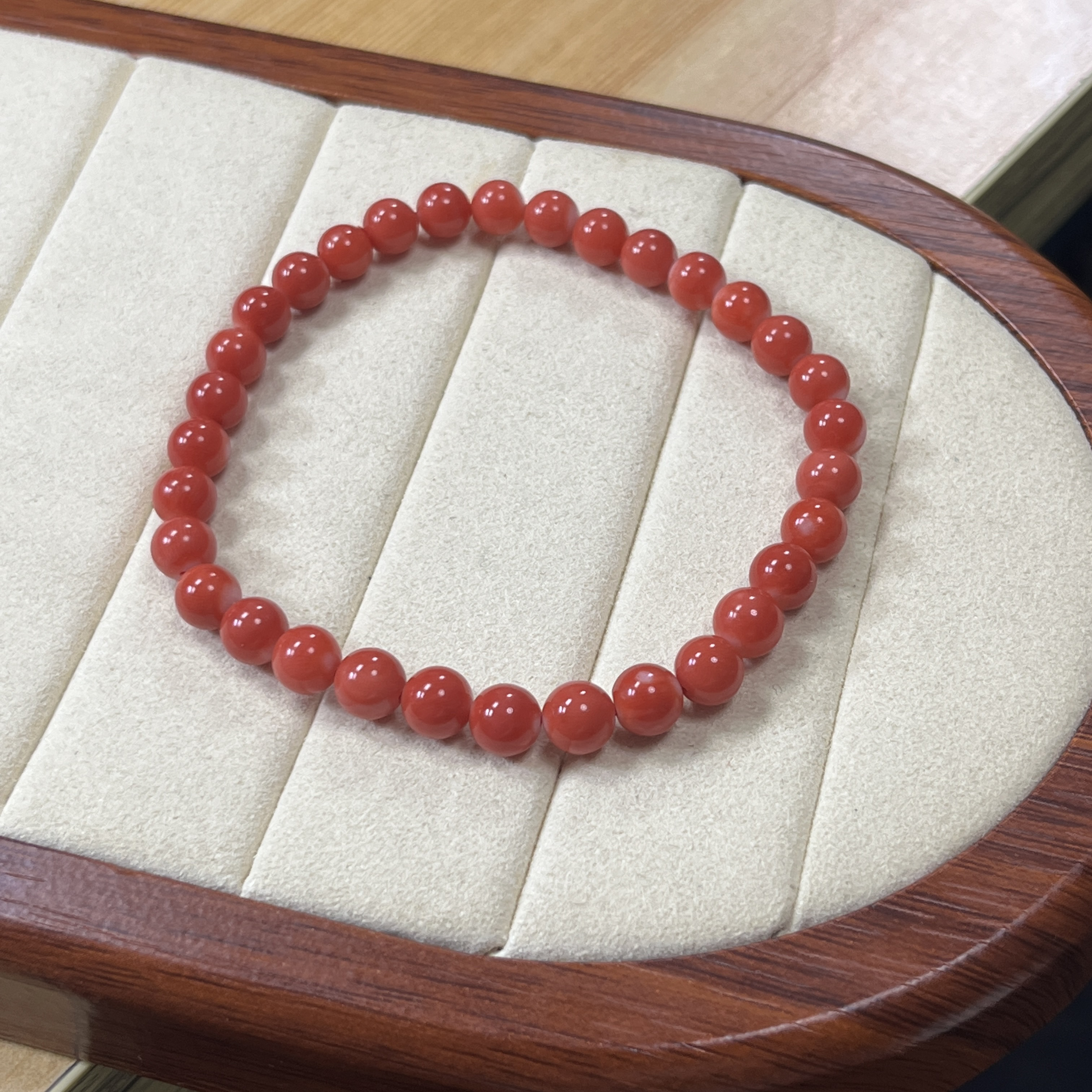 莫莫珊瑚特色红5.5-6.3mm圆珠单圈手串【国检证书】