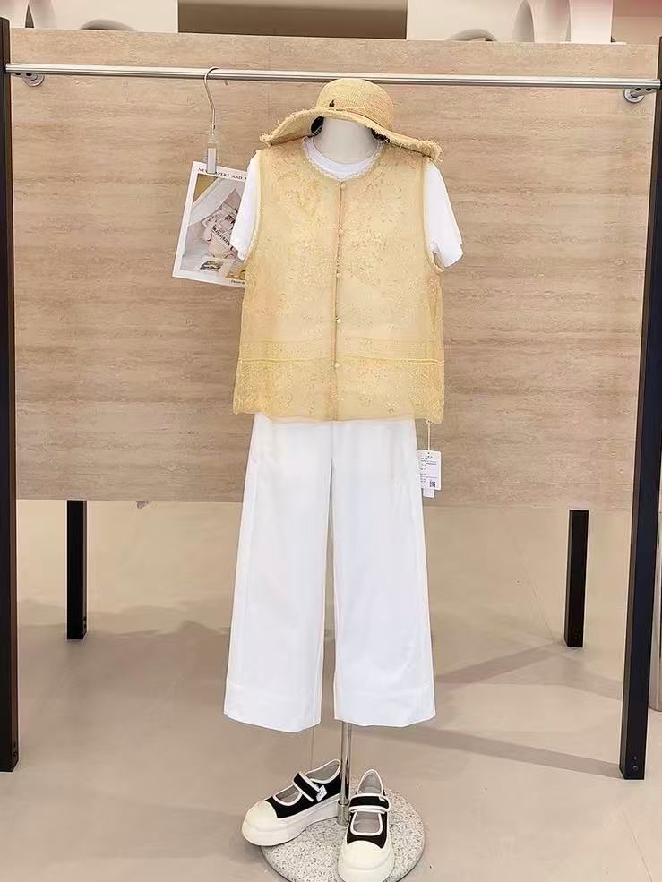 8690轩尚女装“亮片编织拼接网纱马甲”