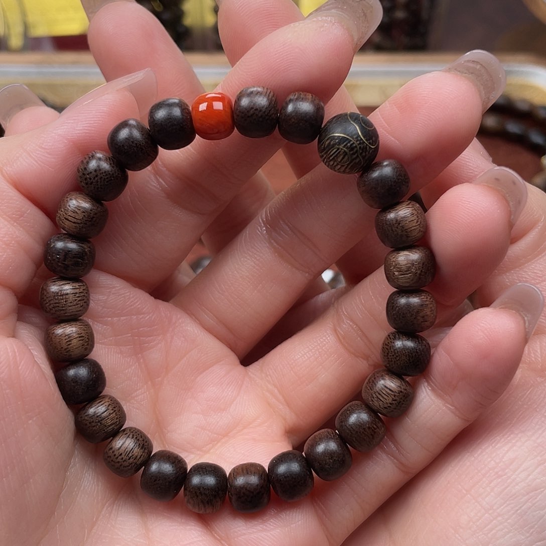 沉香手串h****2越南富森红土玉化沉水料