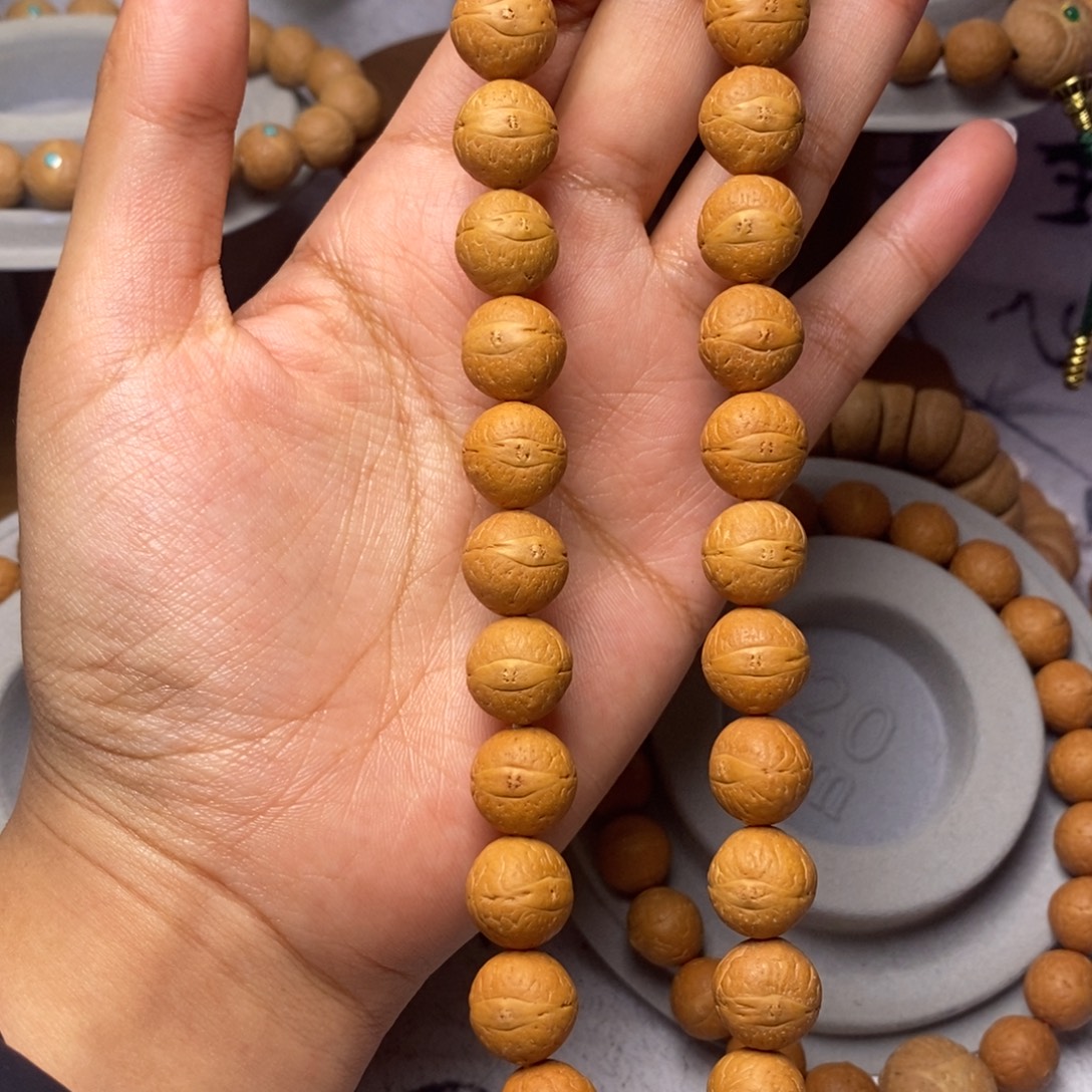 凤眼菩提吊坠手持