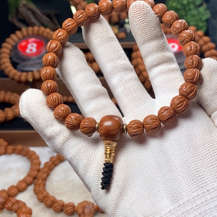 桃核吊坠阿*?秦岭龙纹