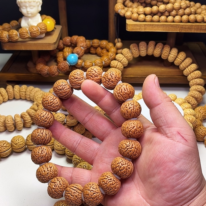 鄙***才吊坠桃核宽脐肌肉