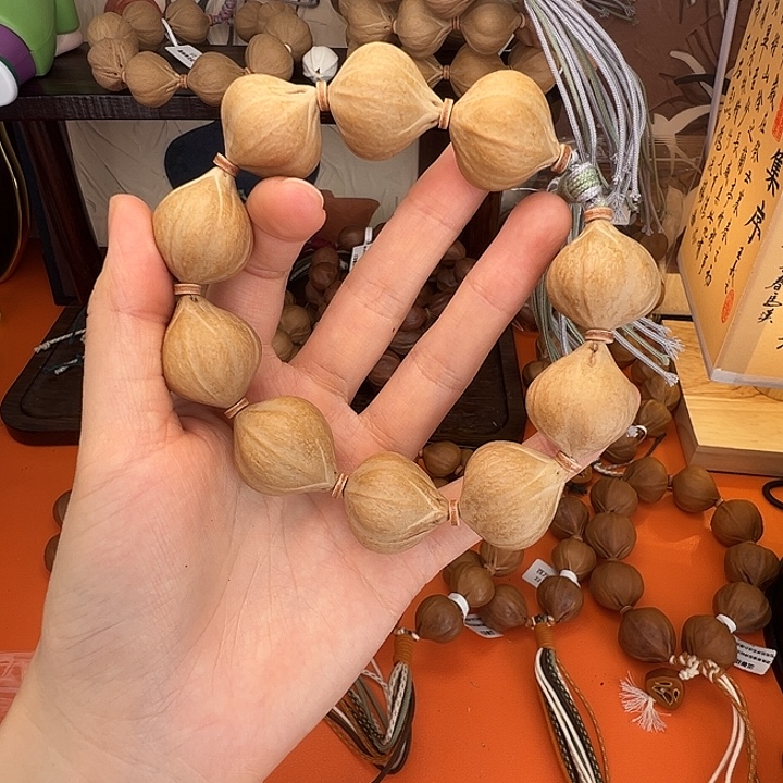 ****…橄榄核吊坠四花蜜桃