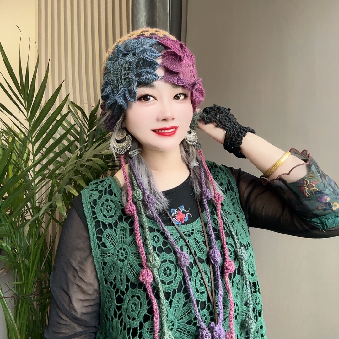 单层羊毛太阳花镂空流苏叮当帽