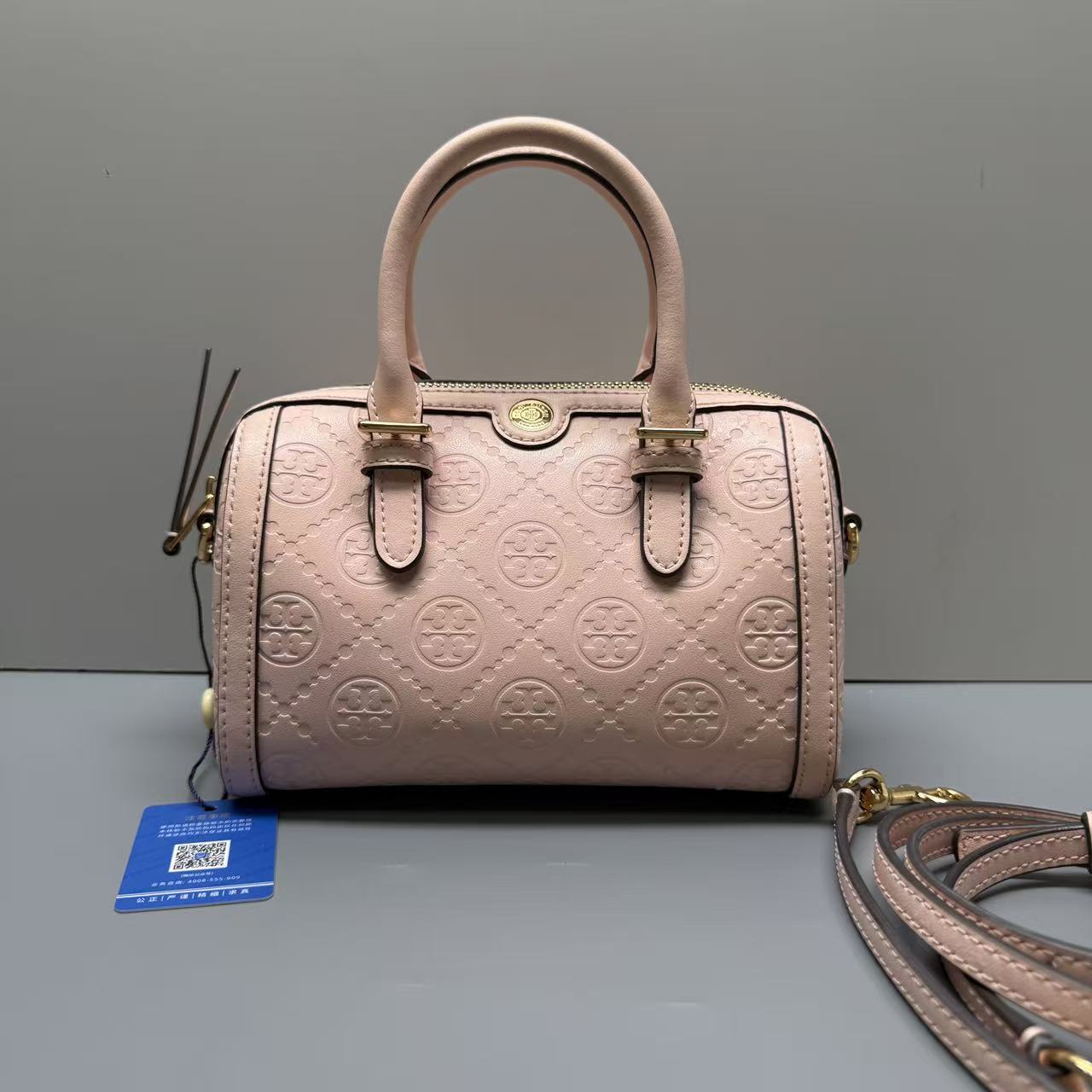 95新 TORY BURCH/汤丽柏琦 粉色压纹波士顿包19*13*11cmEM102209