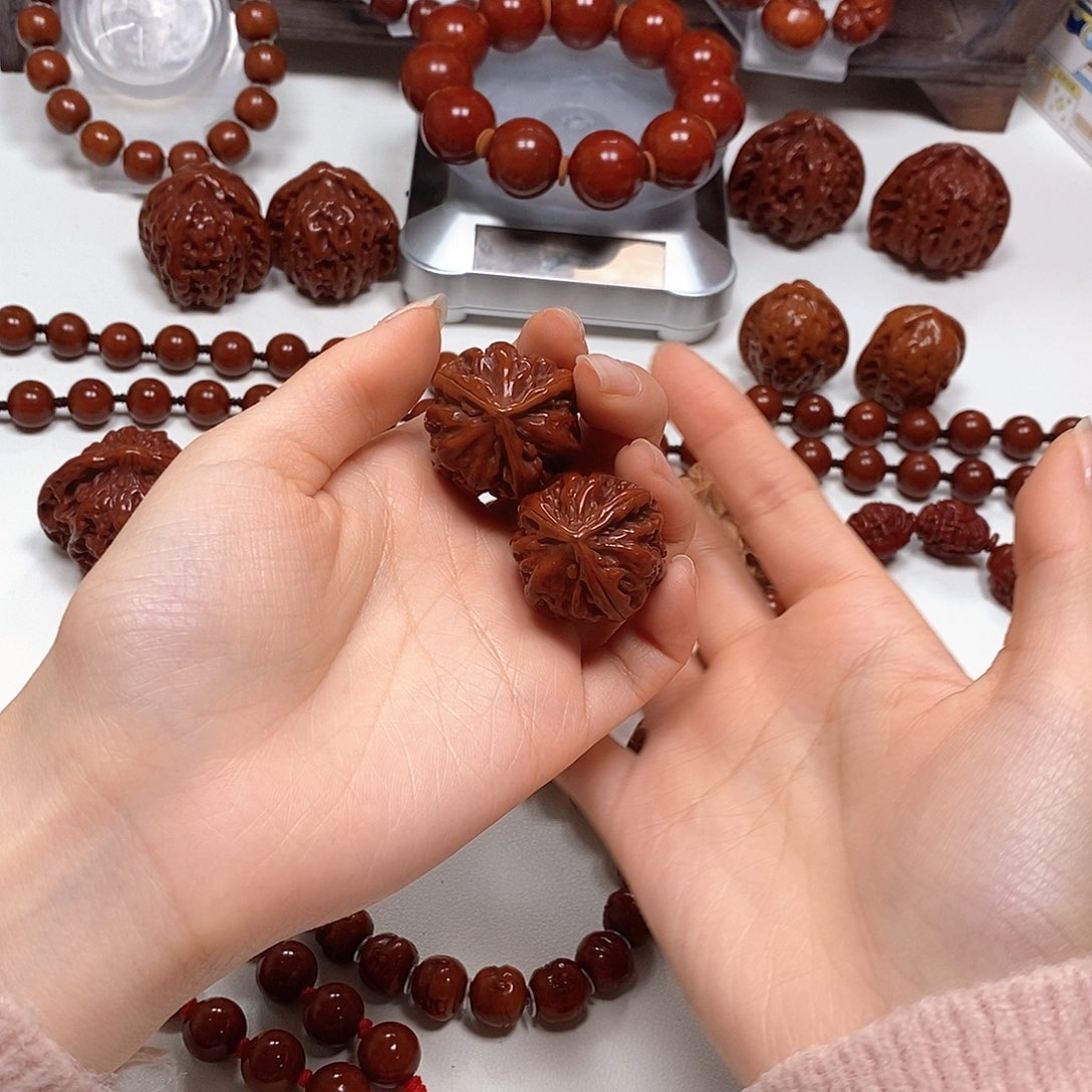 橄榄核把件瑜**腾核桃核桃