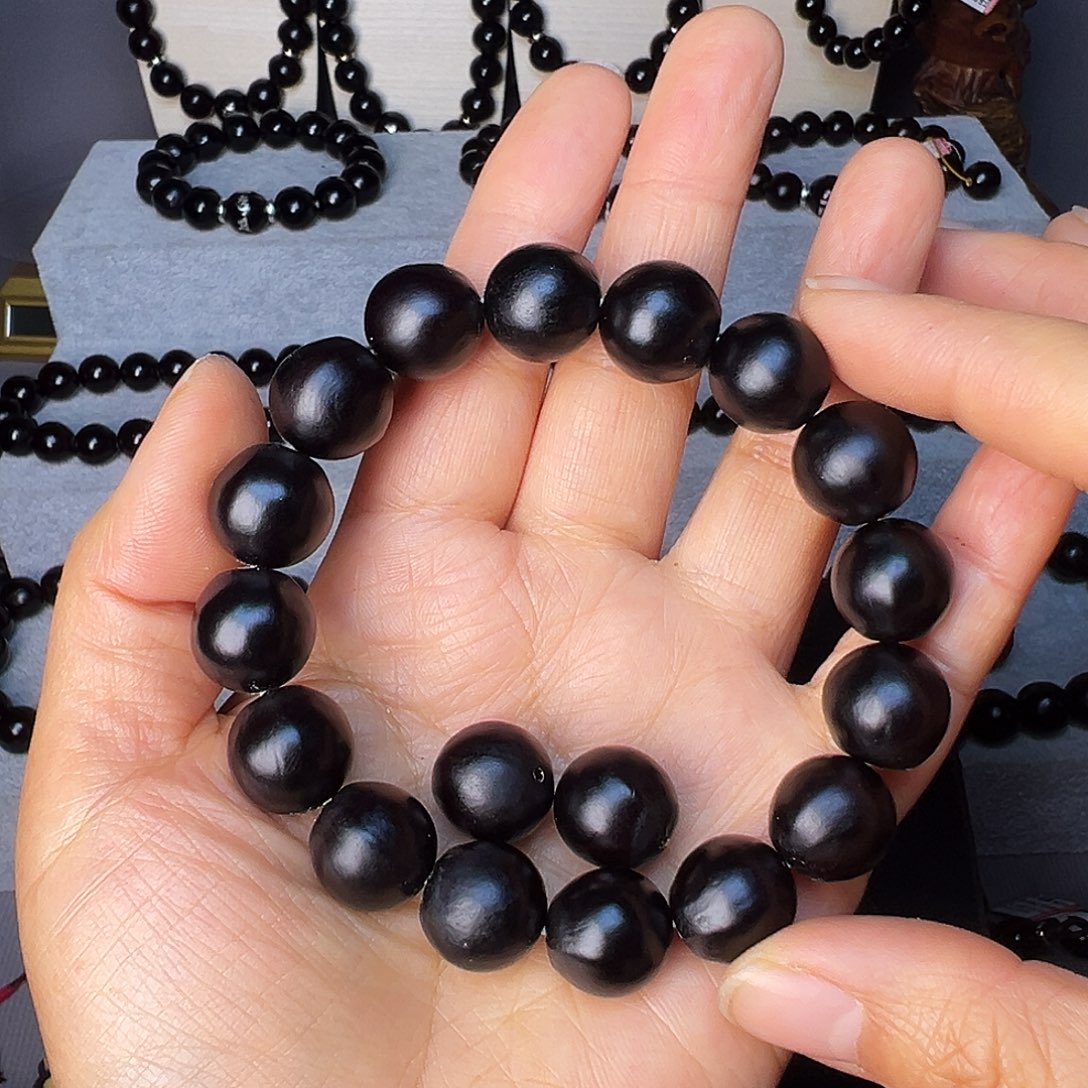 走***。极致精品卡15.2毫米16颗籽手串