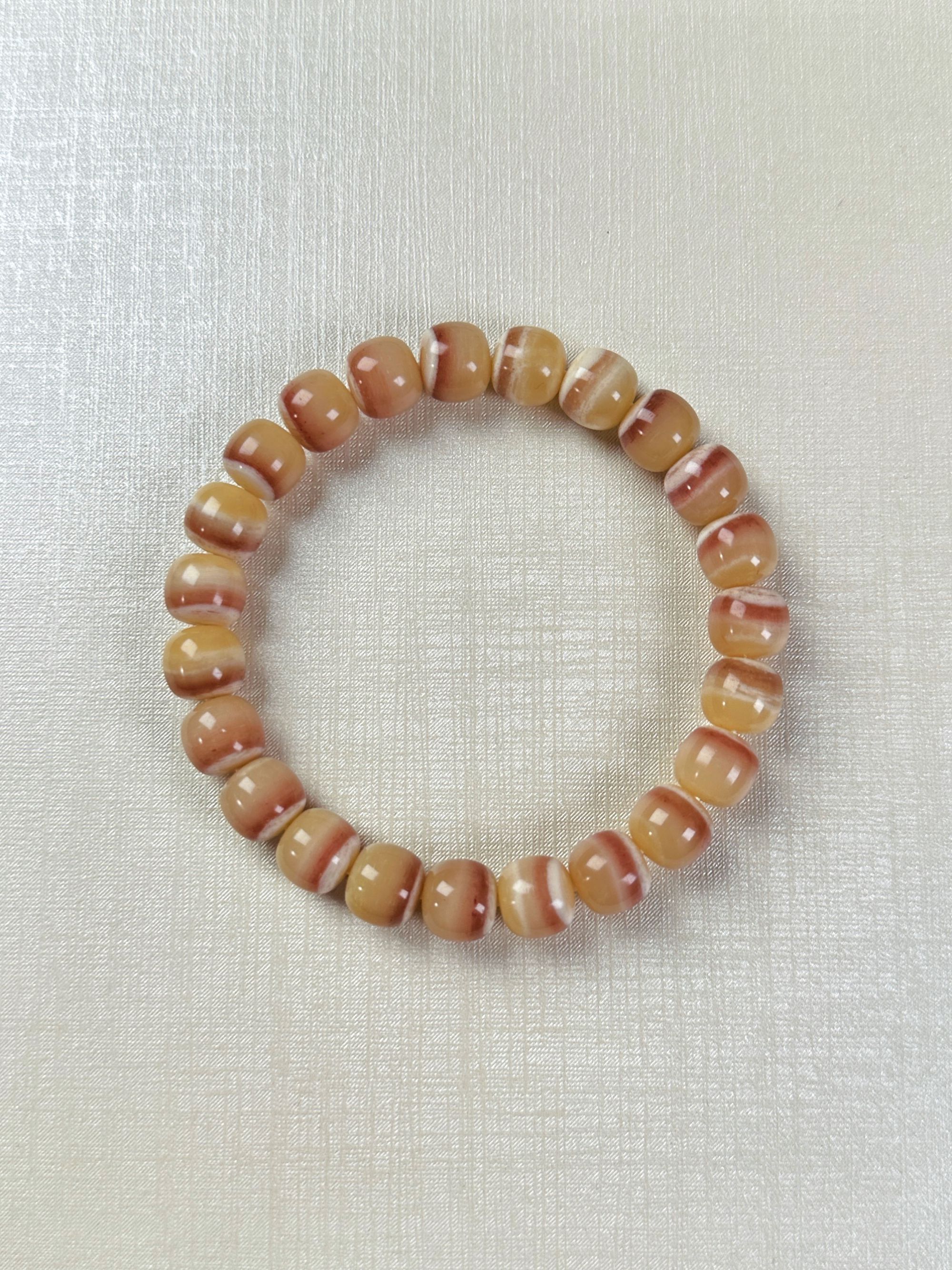 原生态驼骨精品三花奶盖一线微微棕10*9驼骨手串