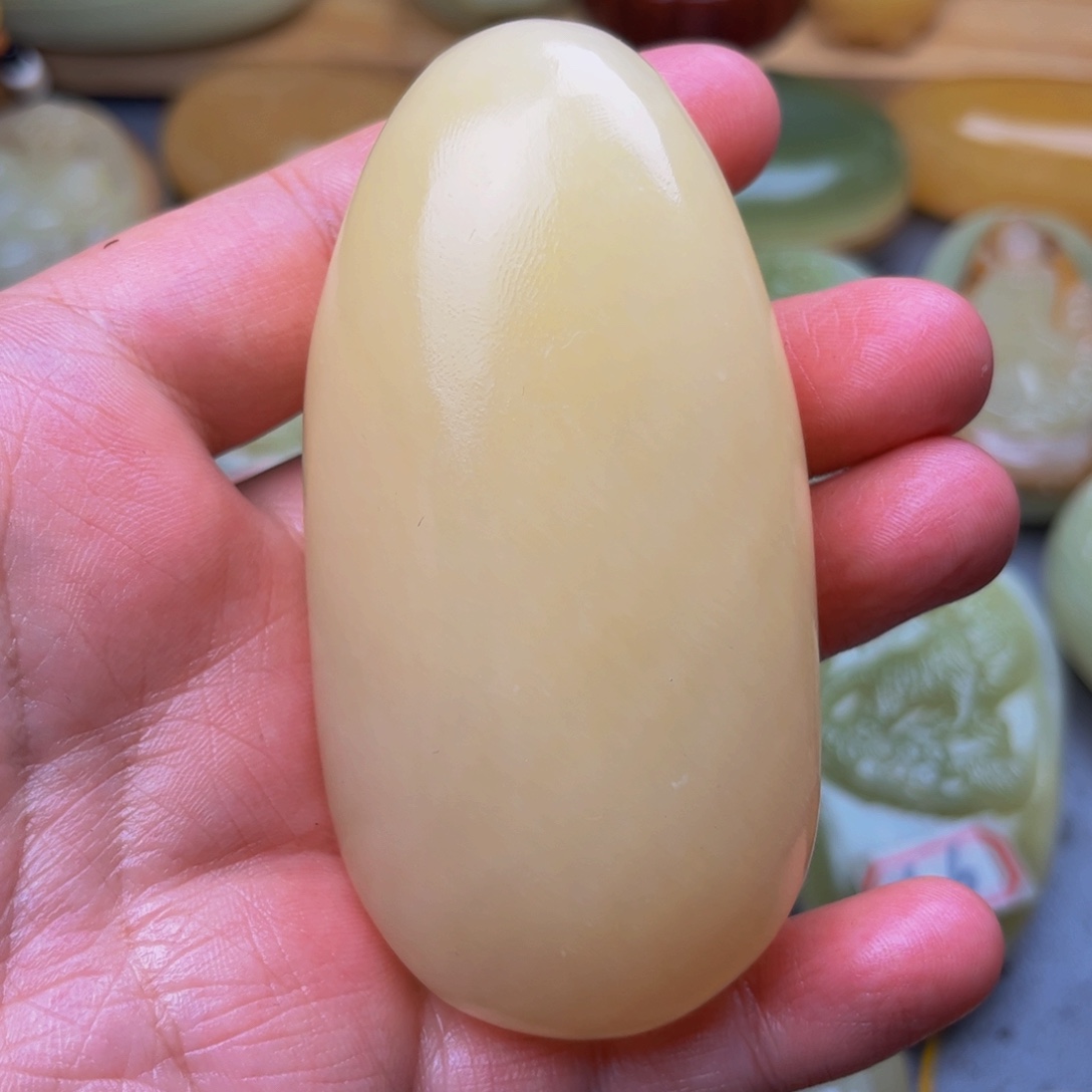 1***7石材方解石手把件