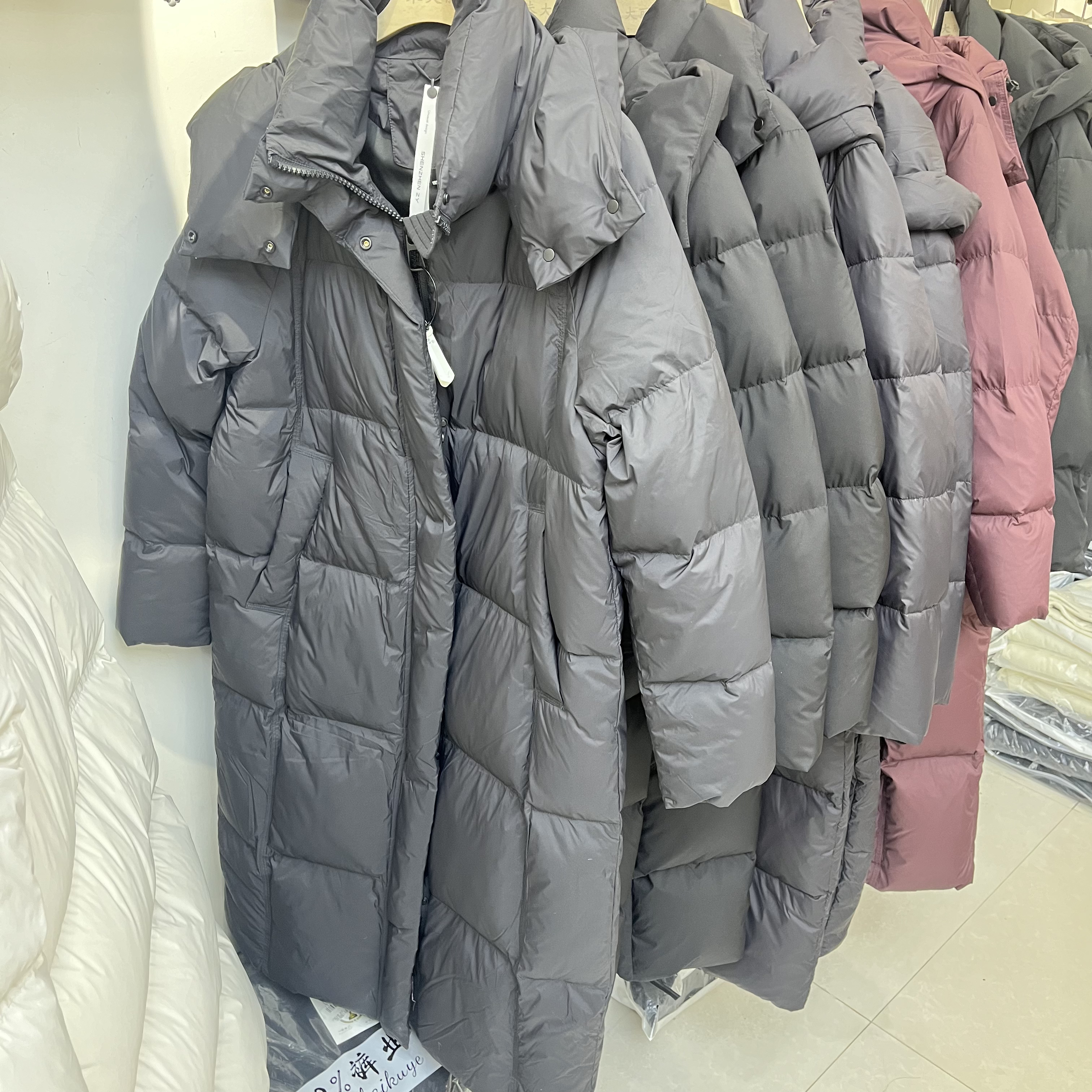 7659羽绒服中长款300g及以上（含）连帽厚款