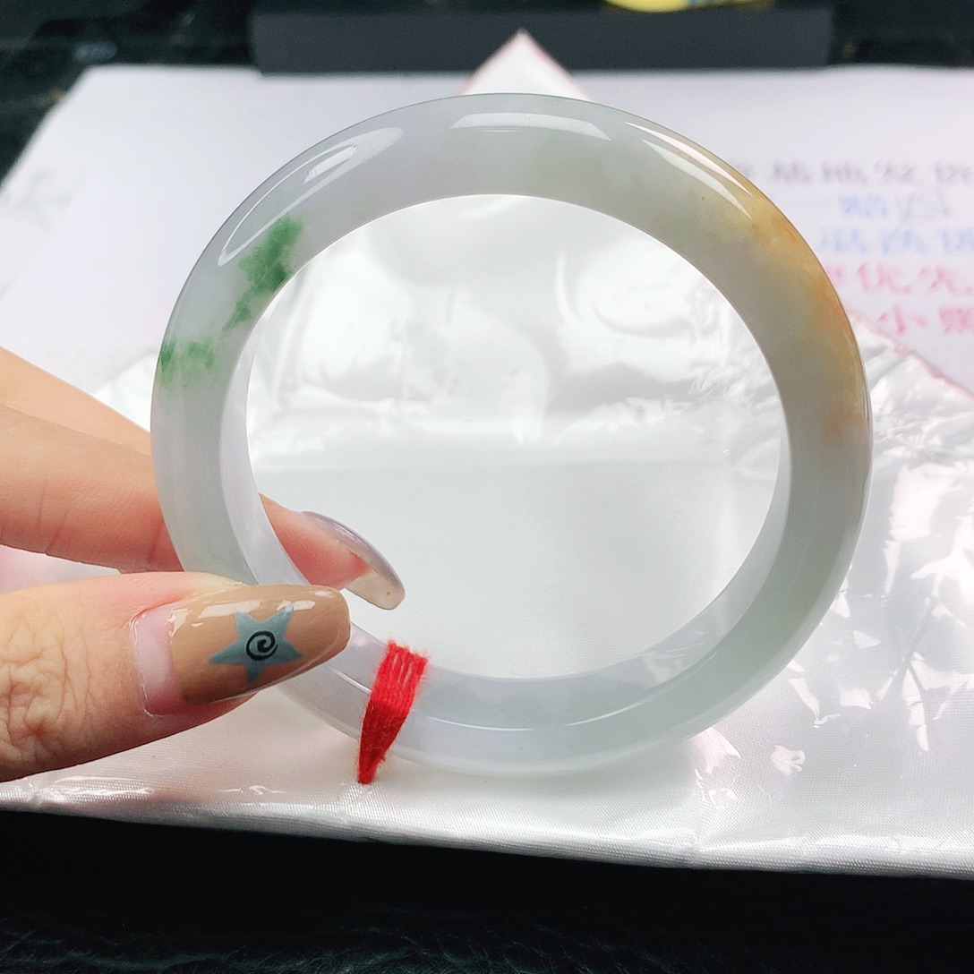 翡翠未镶嵌手镯翡翠59.0蜜糖黄飘绿花正圈