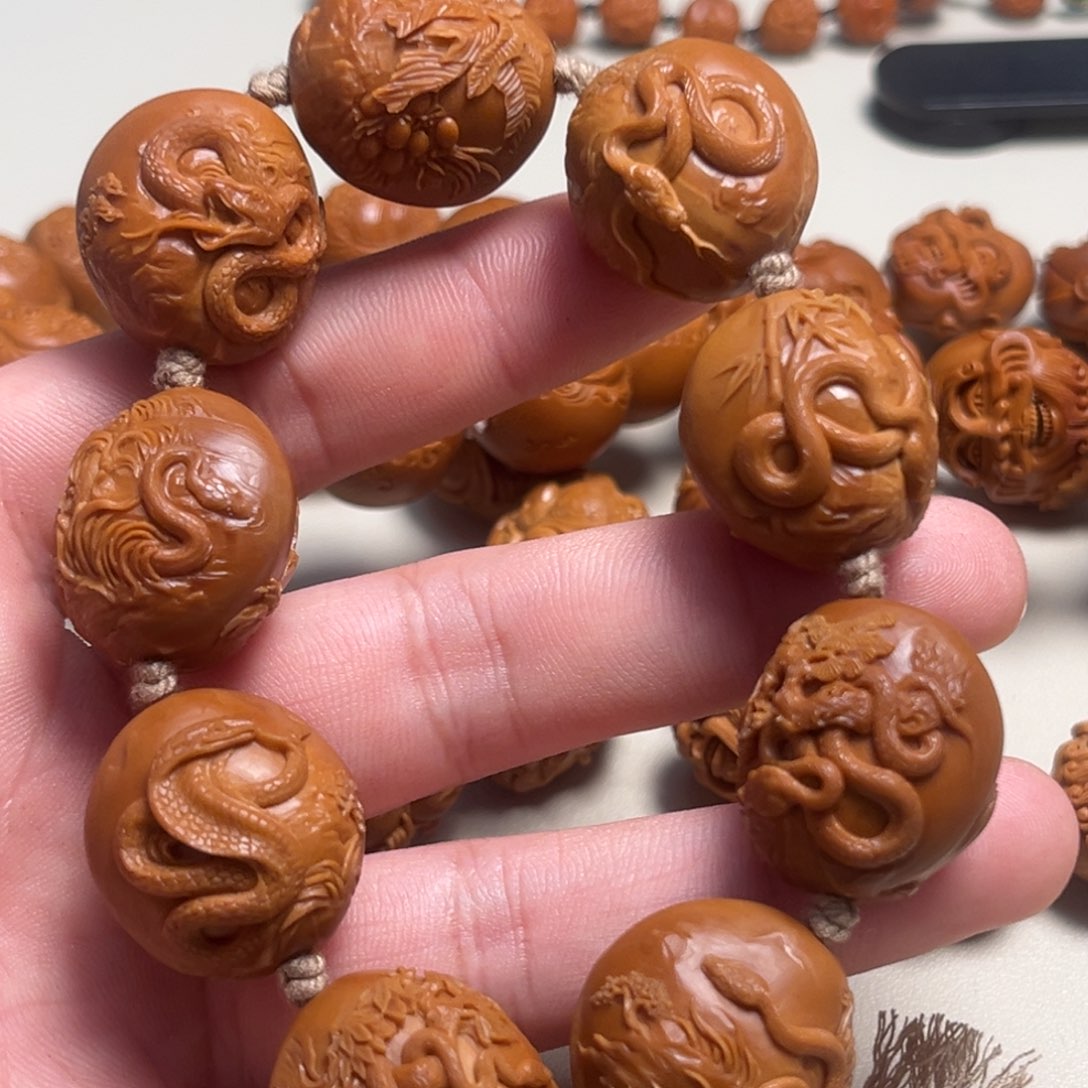 橄榄核吊坠张*福绕蛇年