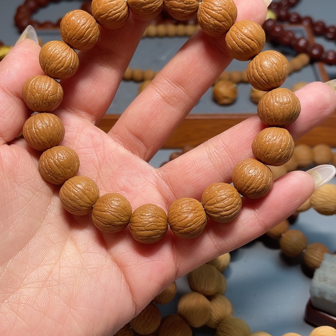 鎏***猴头核桃手串凤羽