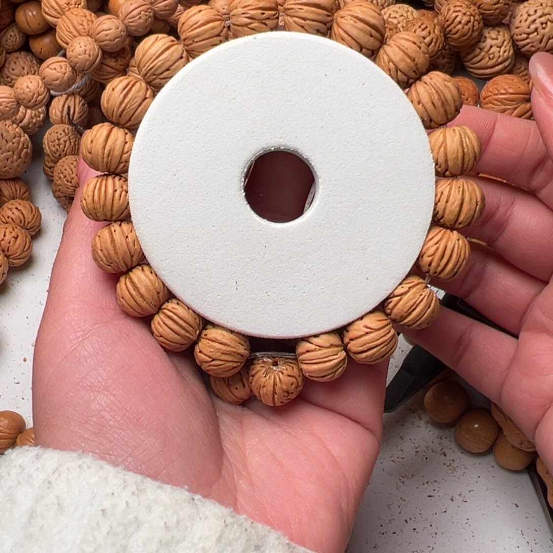 13➕尺寸树王纽扣桃核手串