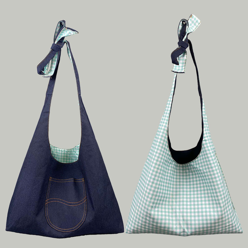 韩系牛仔帆布斜挎包包女2025新款大容量通勤单肩双面背复古托特包