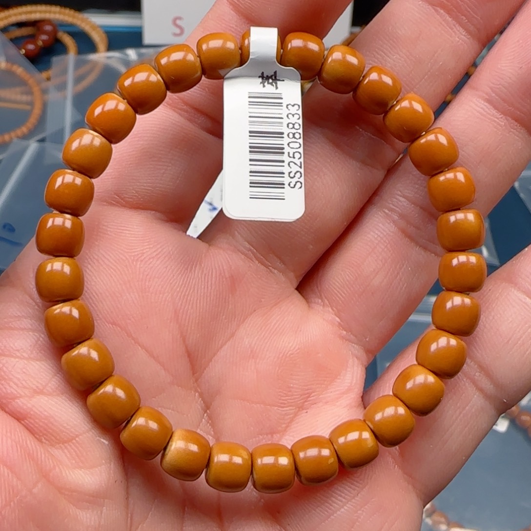 陈***生手串橄榄核老挝SS级核尖极限弧尺寸7.4