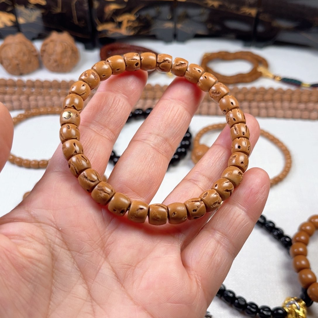 桃核吊坠法****电4456677788888