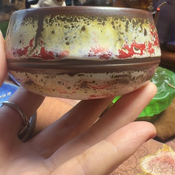 熠羽毛球的钧瓷杯杯