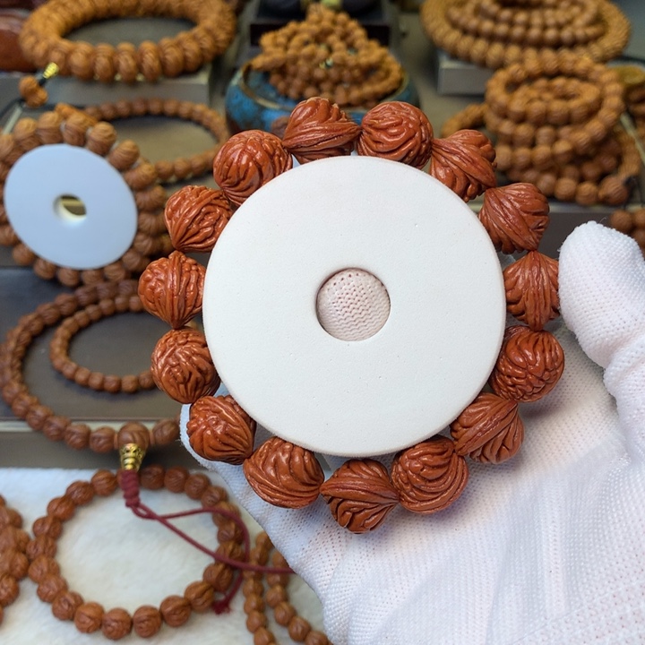 浅***…桃核手串秦岭龙纹