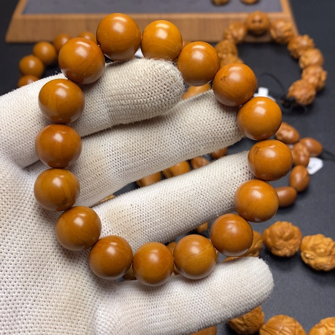 橄榄核手串/手链璟****司正圆光珠（泛油