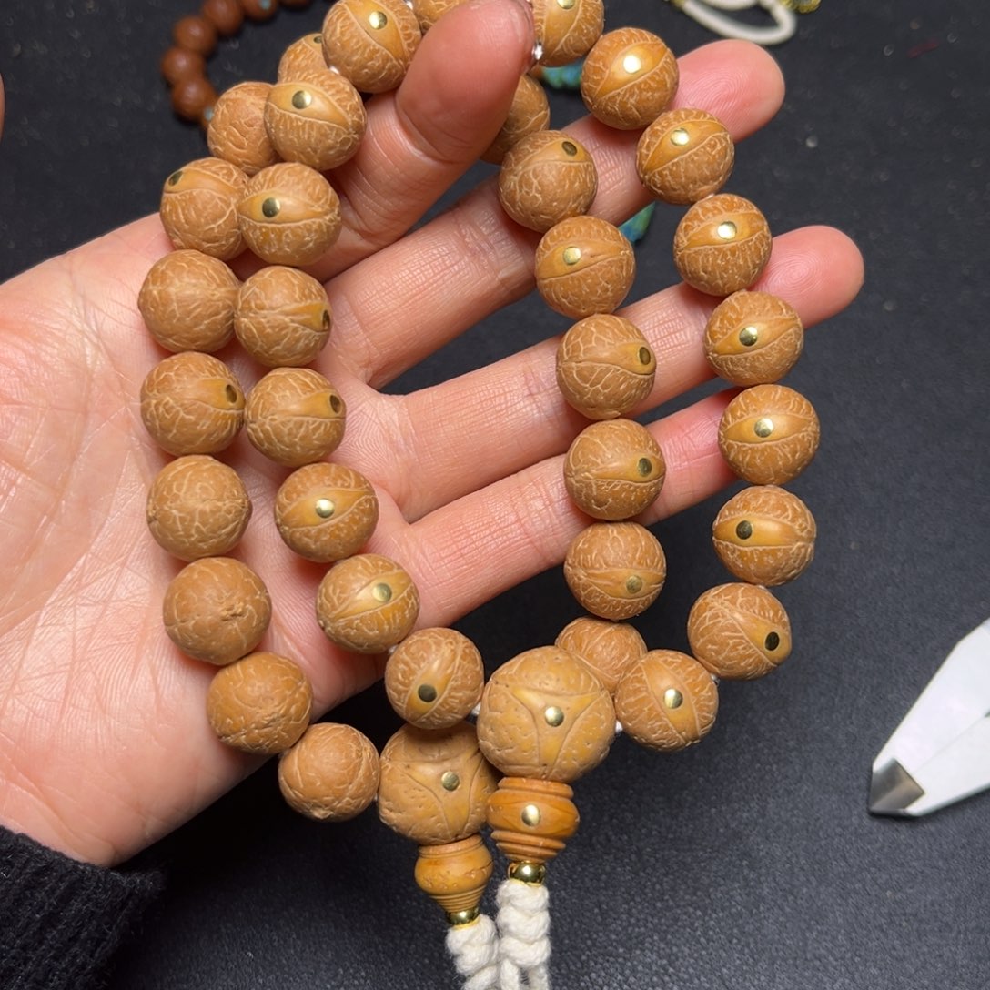 凤眼菩提吊坠13+mm铜钉手串