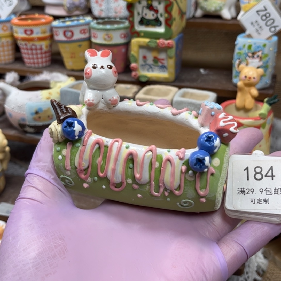 184兔子抱抱卷花盆微瑕