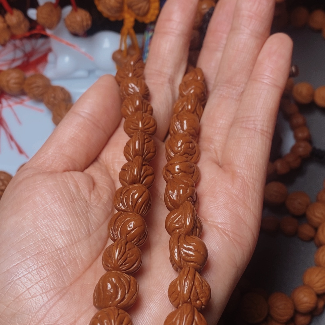 阿***树吊坠桃核桃枭手持1