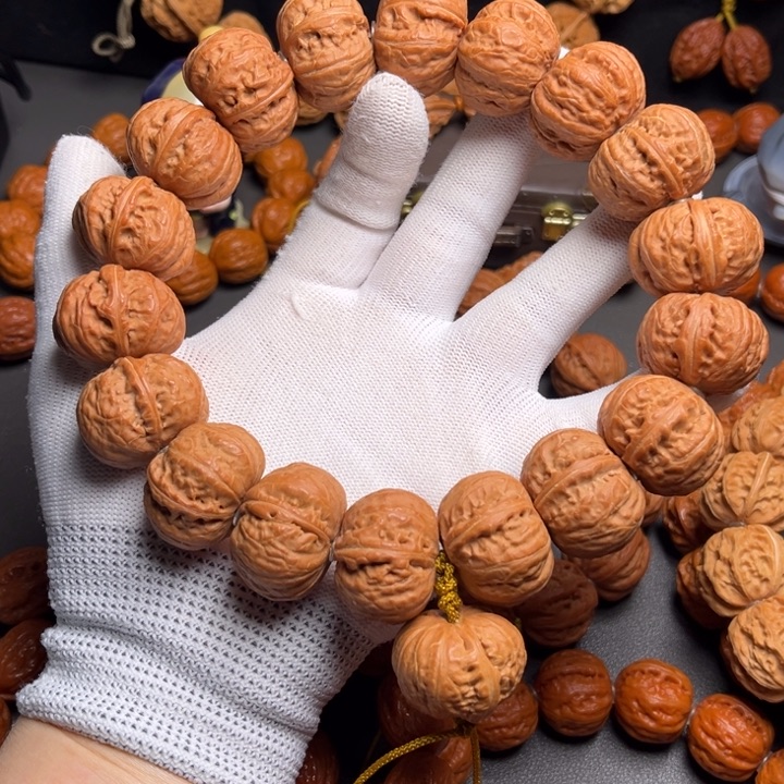 小***人文玩核桃手串磨盘