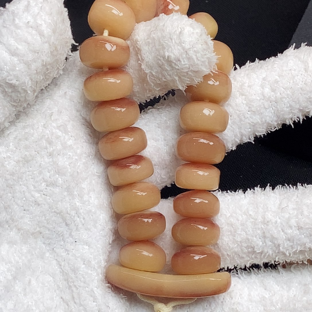 橙***鱼手串/手链驼骨手持