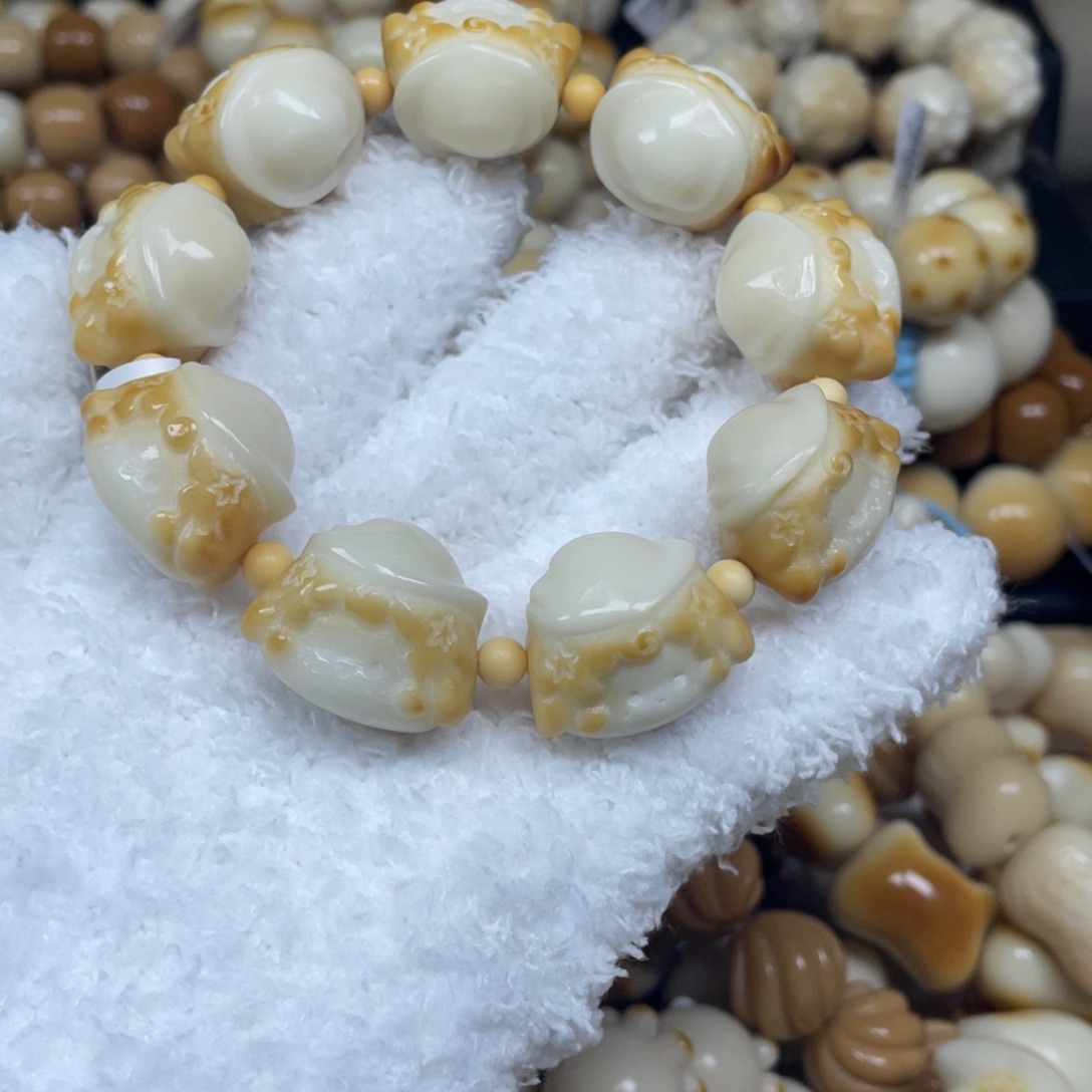 手串菩提根/象牙果12,13.3小洋熊