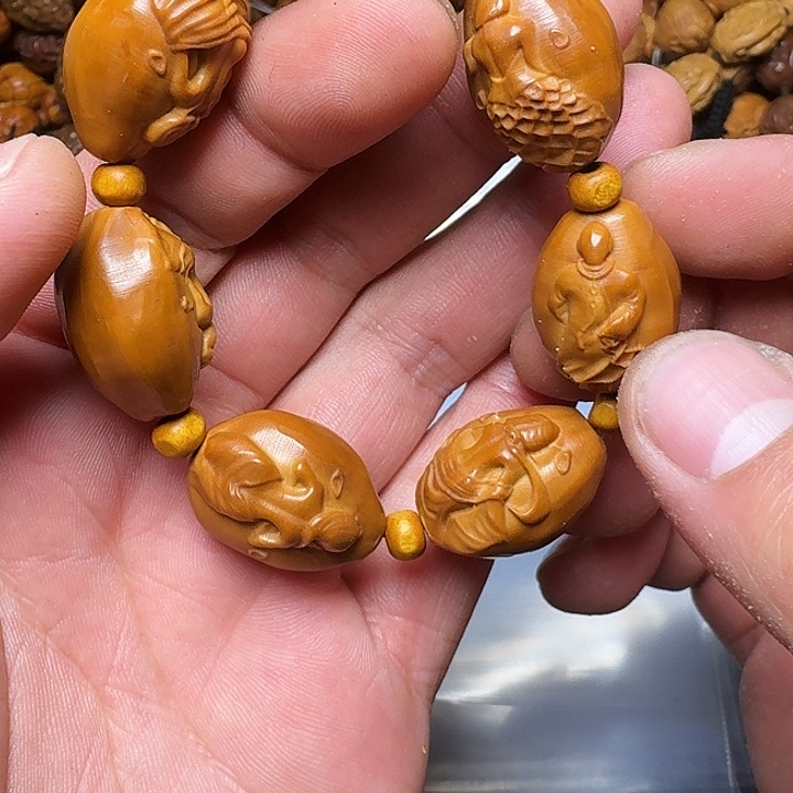 橄榄核手串你是谁