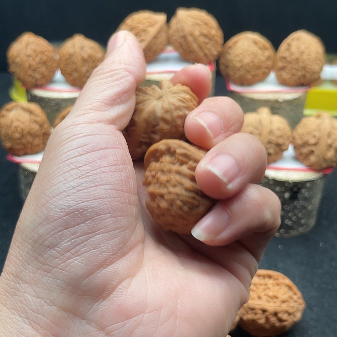 文玩核桃把件老*南疆文玩核桃手把件