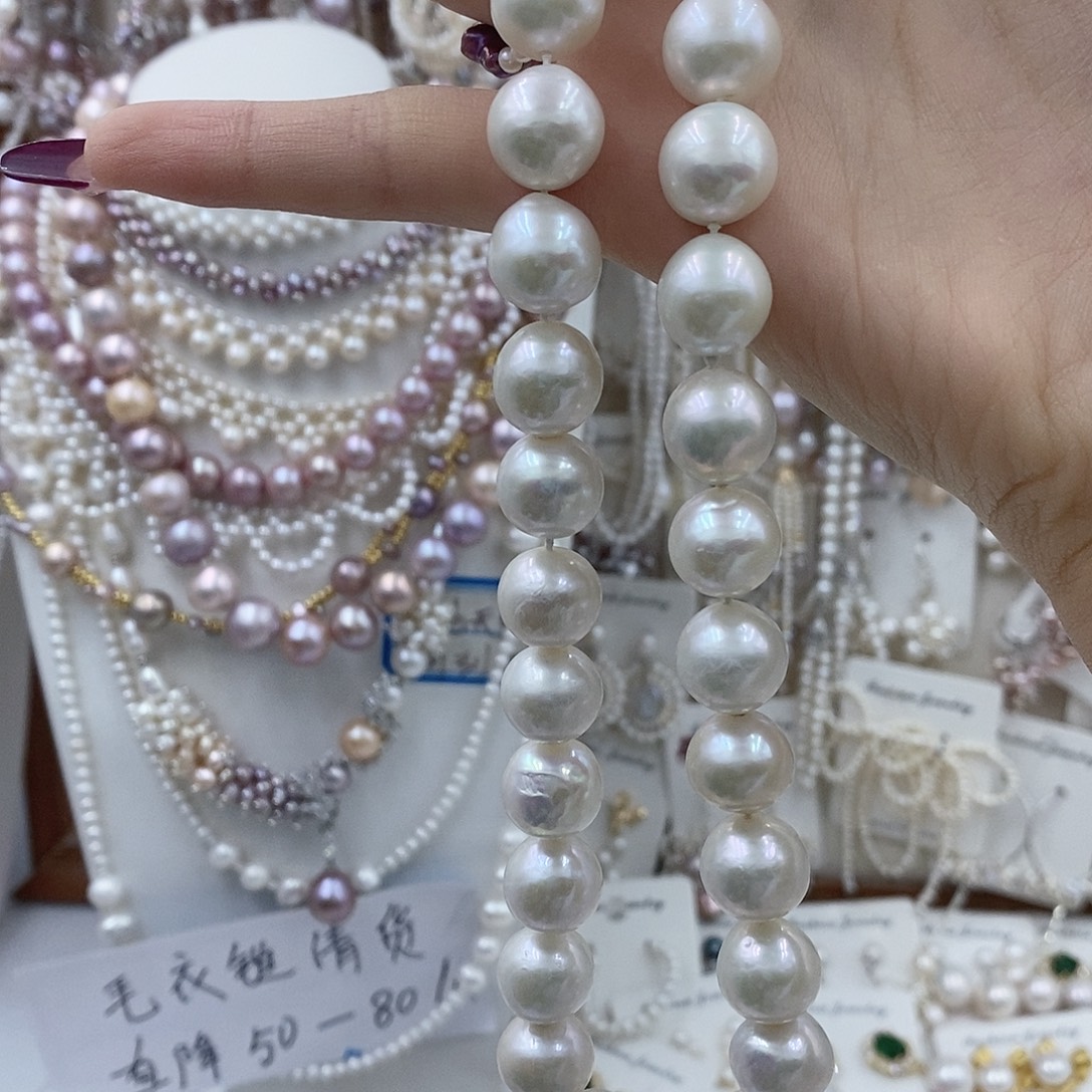 尼***吖银S925镶嵌淡水珍珠耳饰