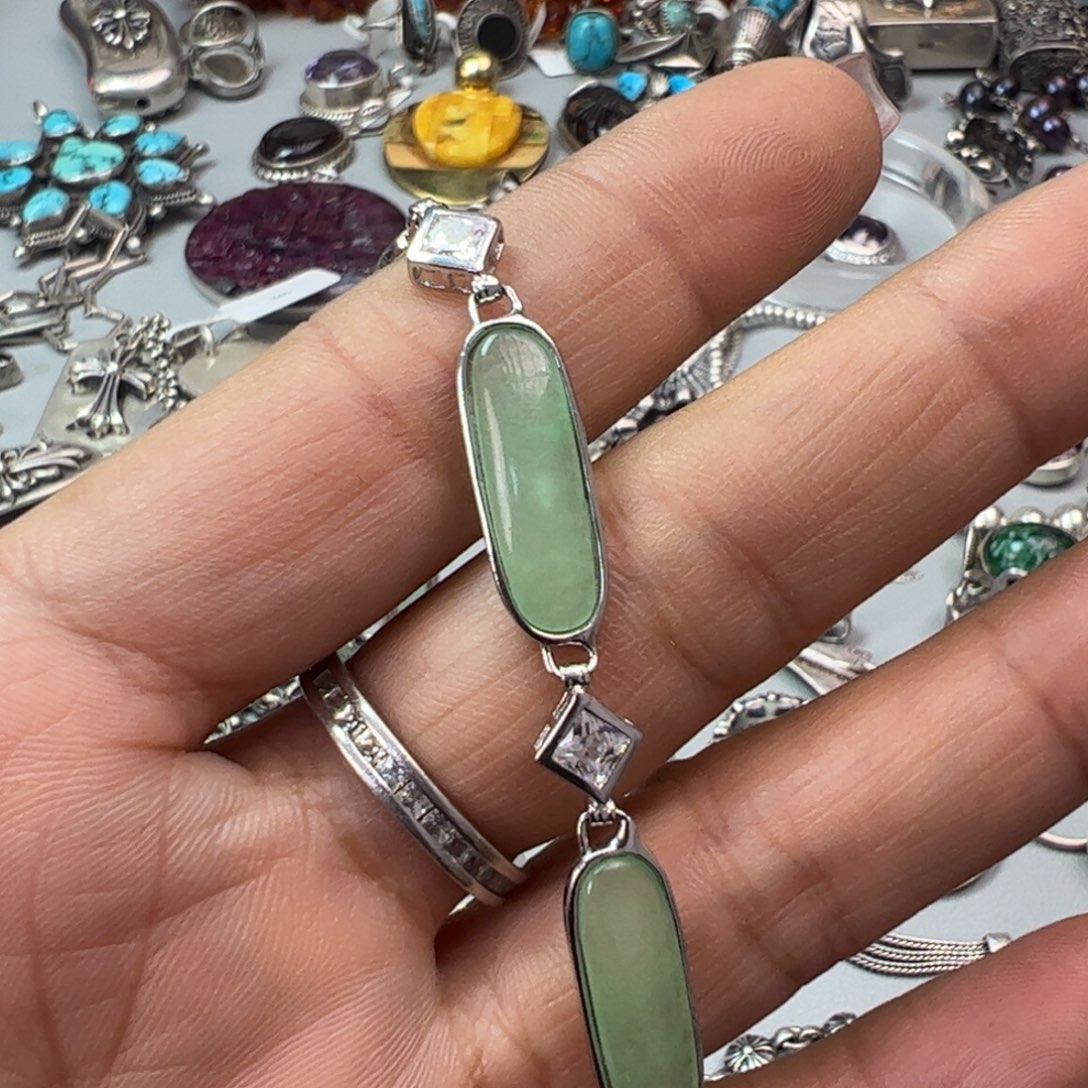 火***）花岗石铁合金925银手链一个