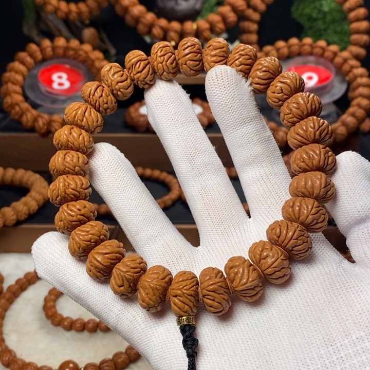 桃核吊坠如**当秦岭龙纹