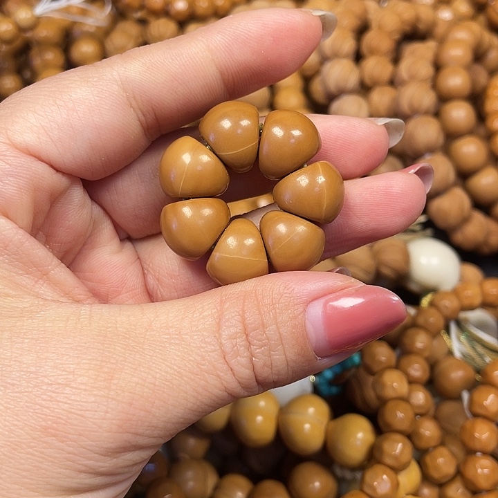 木全品太阳花手捻。     