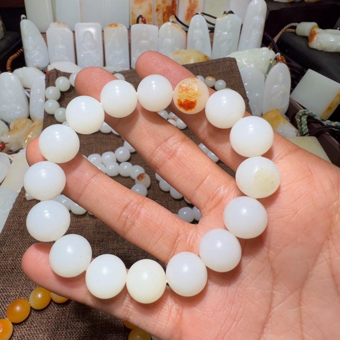 和田玉手串未镶嵌乞**子