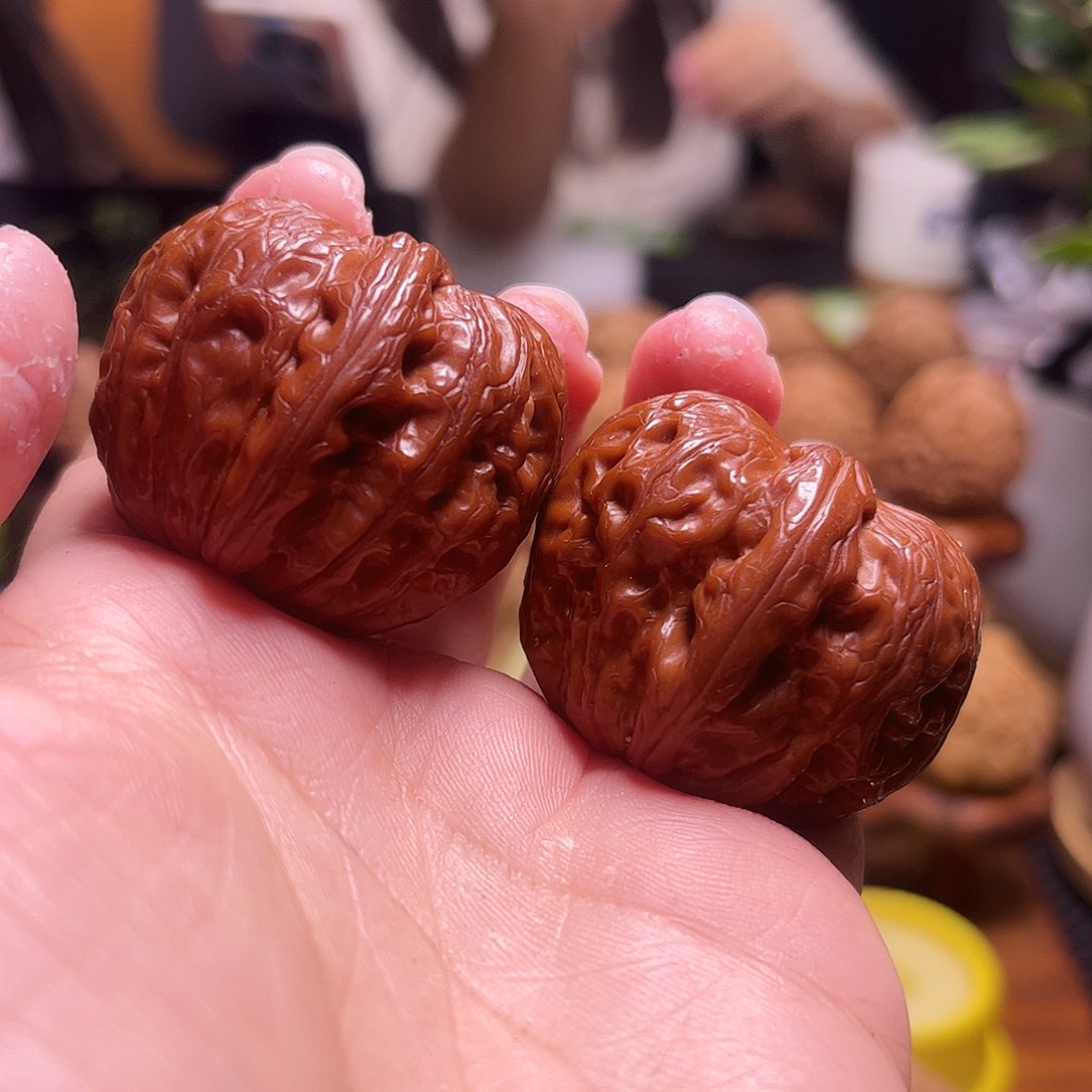 浅***。把件文玩核桃38+红元宝33