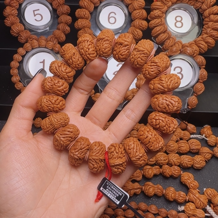 自***路桃核手串五爪金龙手串