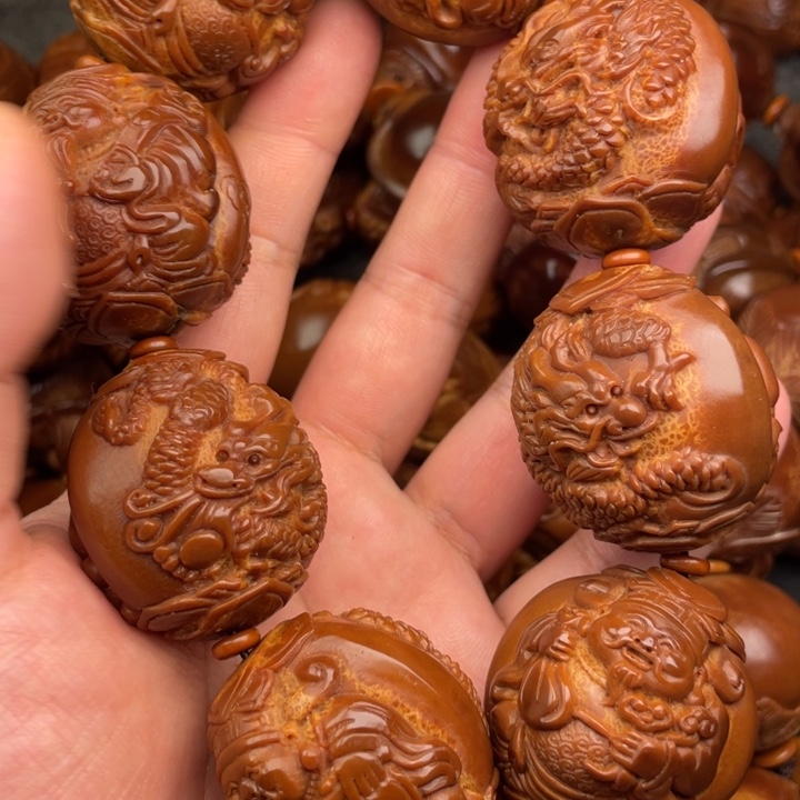 向***展橄榄核吊坠橄榄核