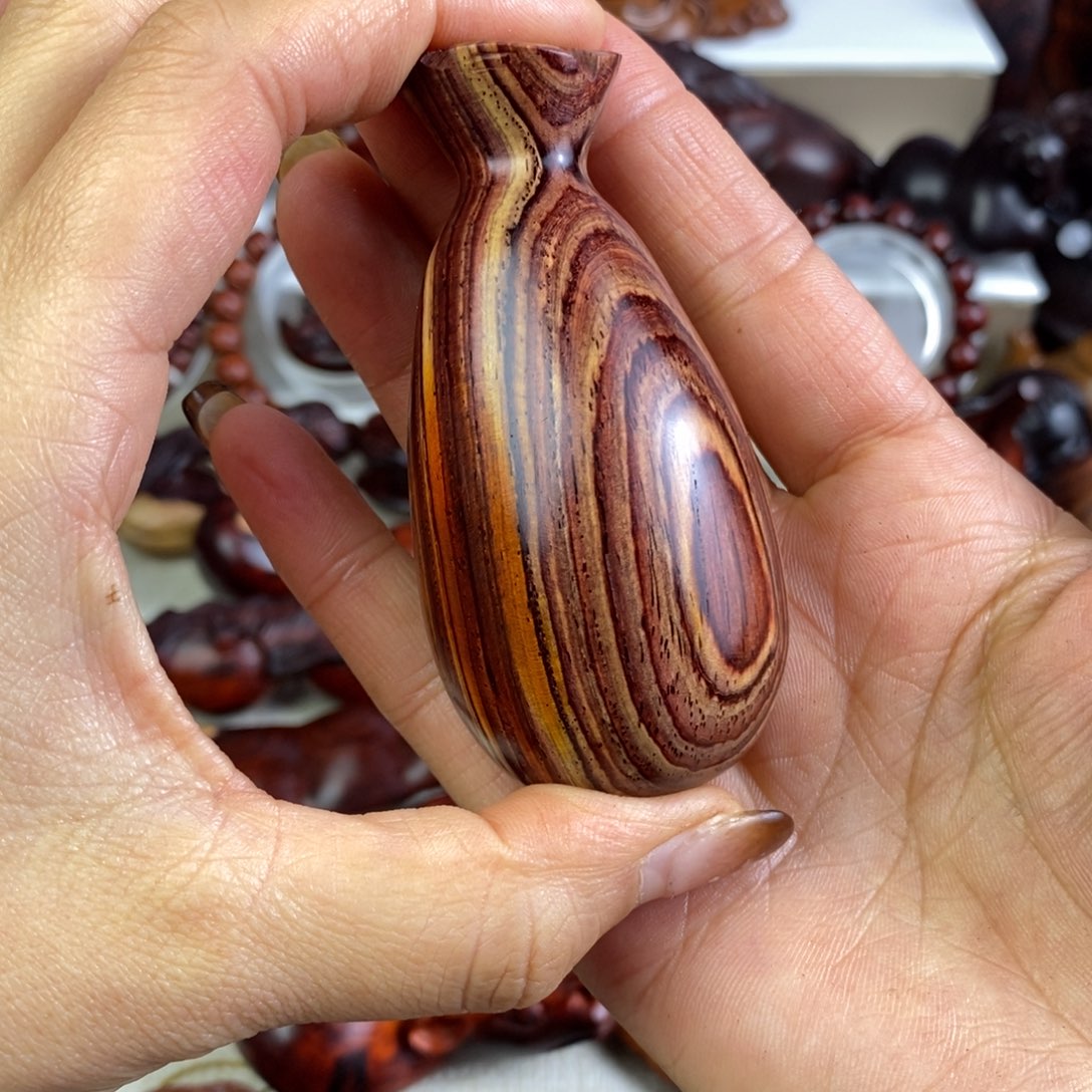 木微凹黄檀钱袋子手把件