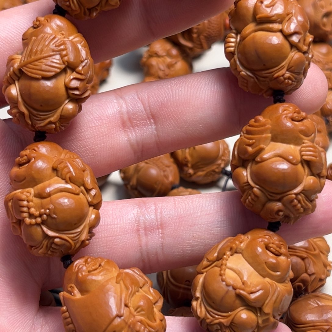 橄榄核吊坠玖****。整身弥勒